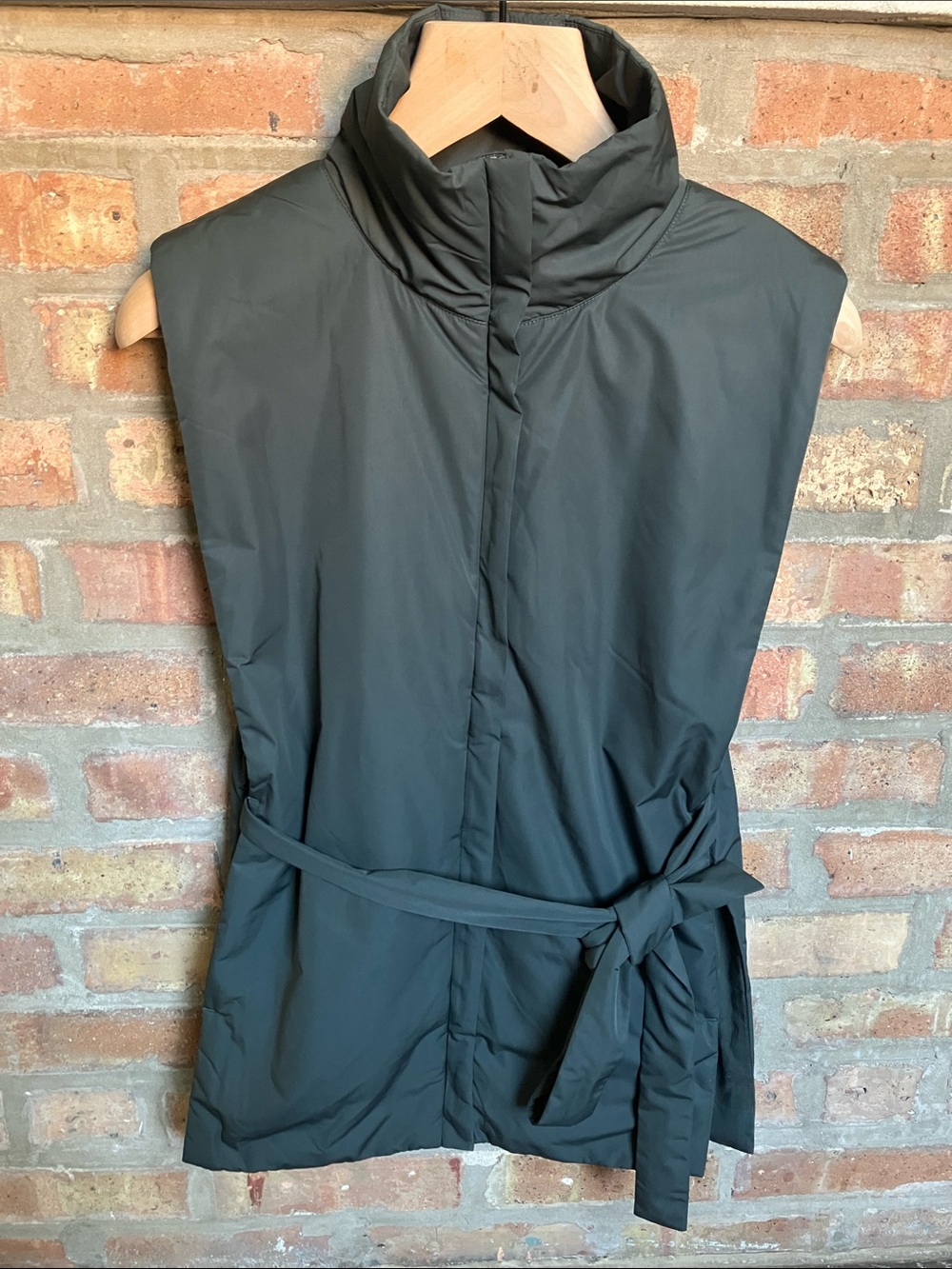 dark green COS high-neck padded vest
